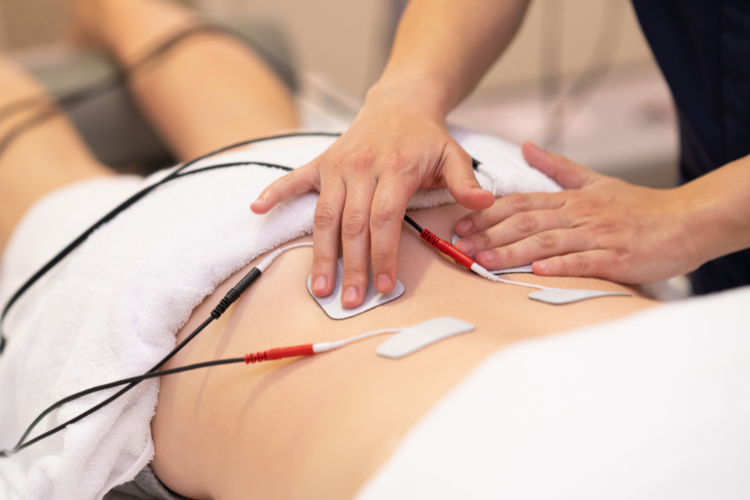 Neuromuscular stimulation therapy for lower back rehabilitation
